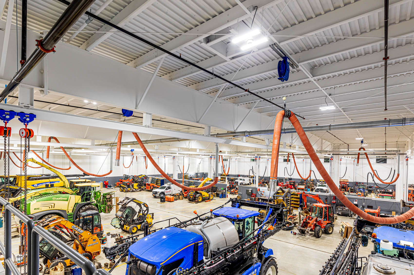 Overhead ventilation and hoses.